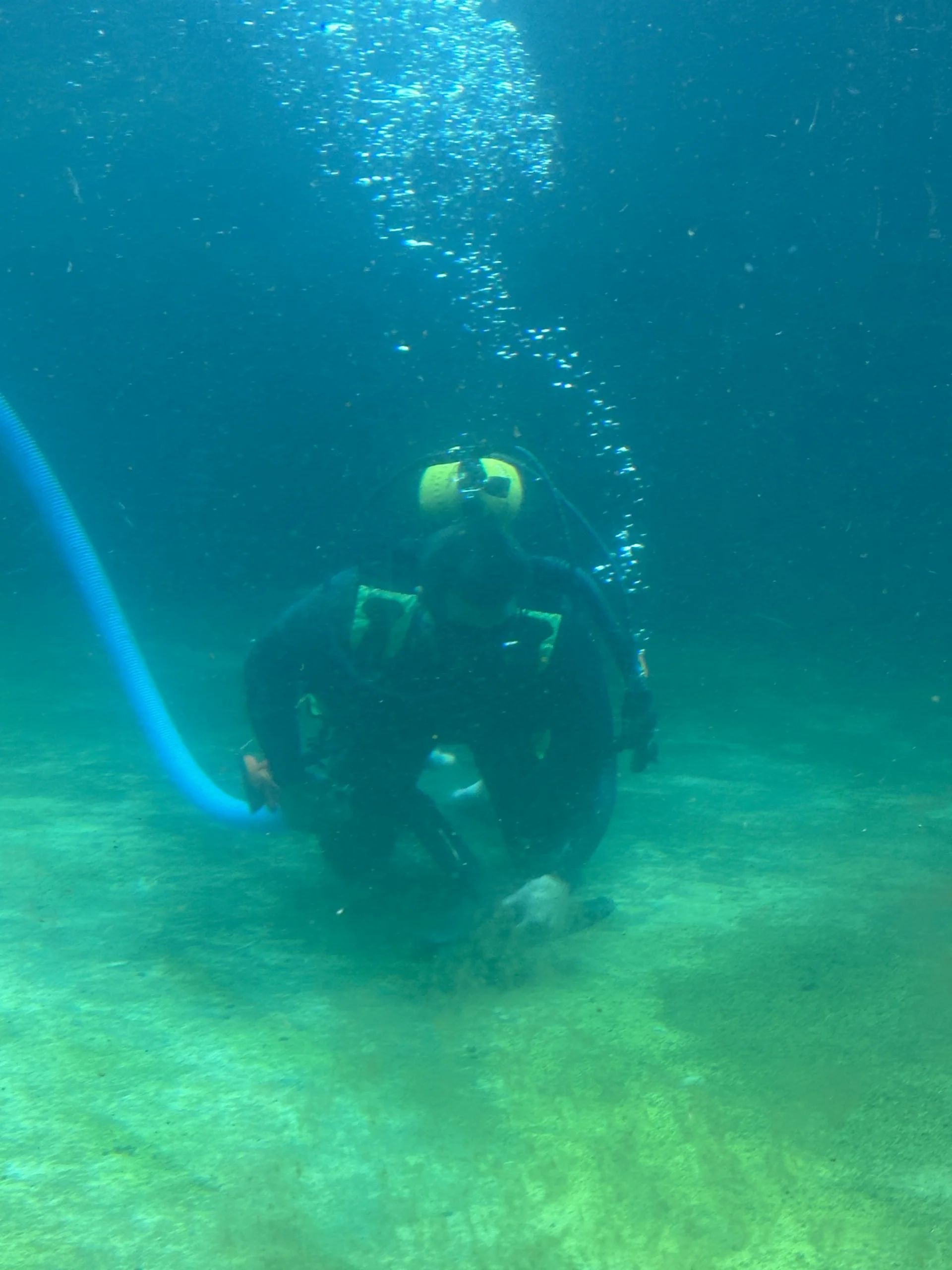 Brett scuba diving inside a polar bear enclosure in Alaska